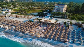 Private beach, white sand, sun-loungers, beach umbrellas