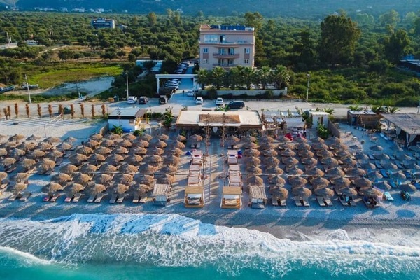 Private beach, white sand, sun loungers, beach umbrellas