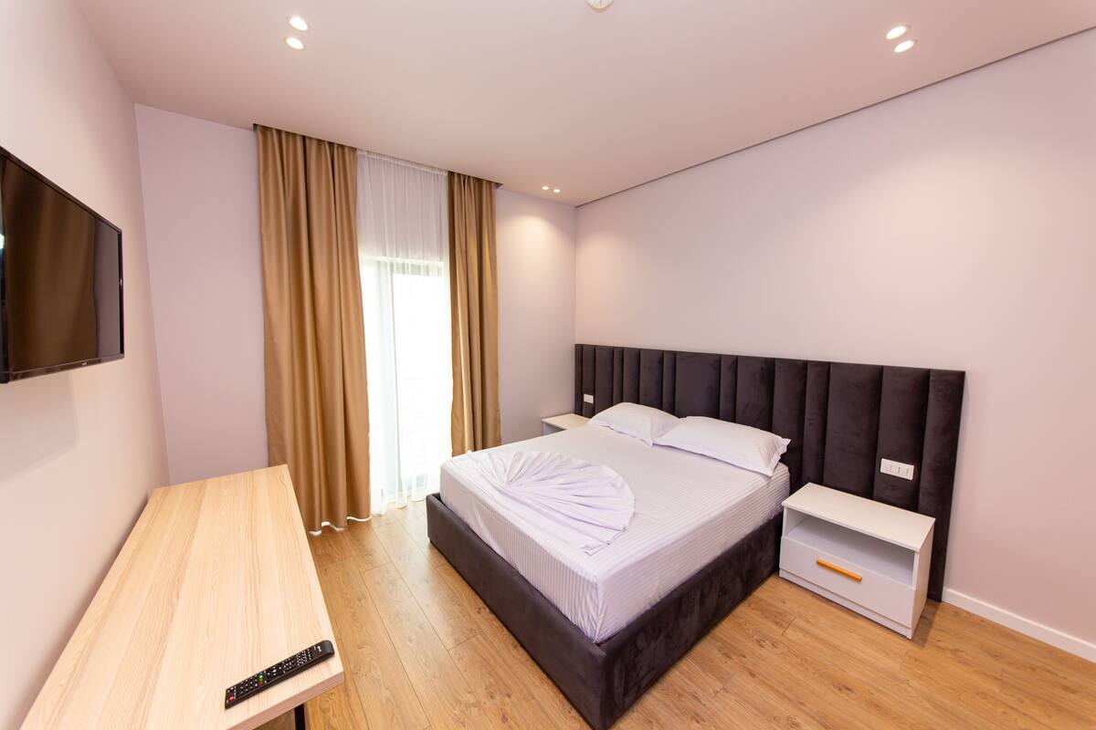 Double Room | Minibar, in-room safe, desk, blackout curtains