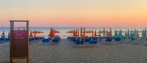 Private beach nearby, black sand, sun loungers, beach umbrellas