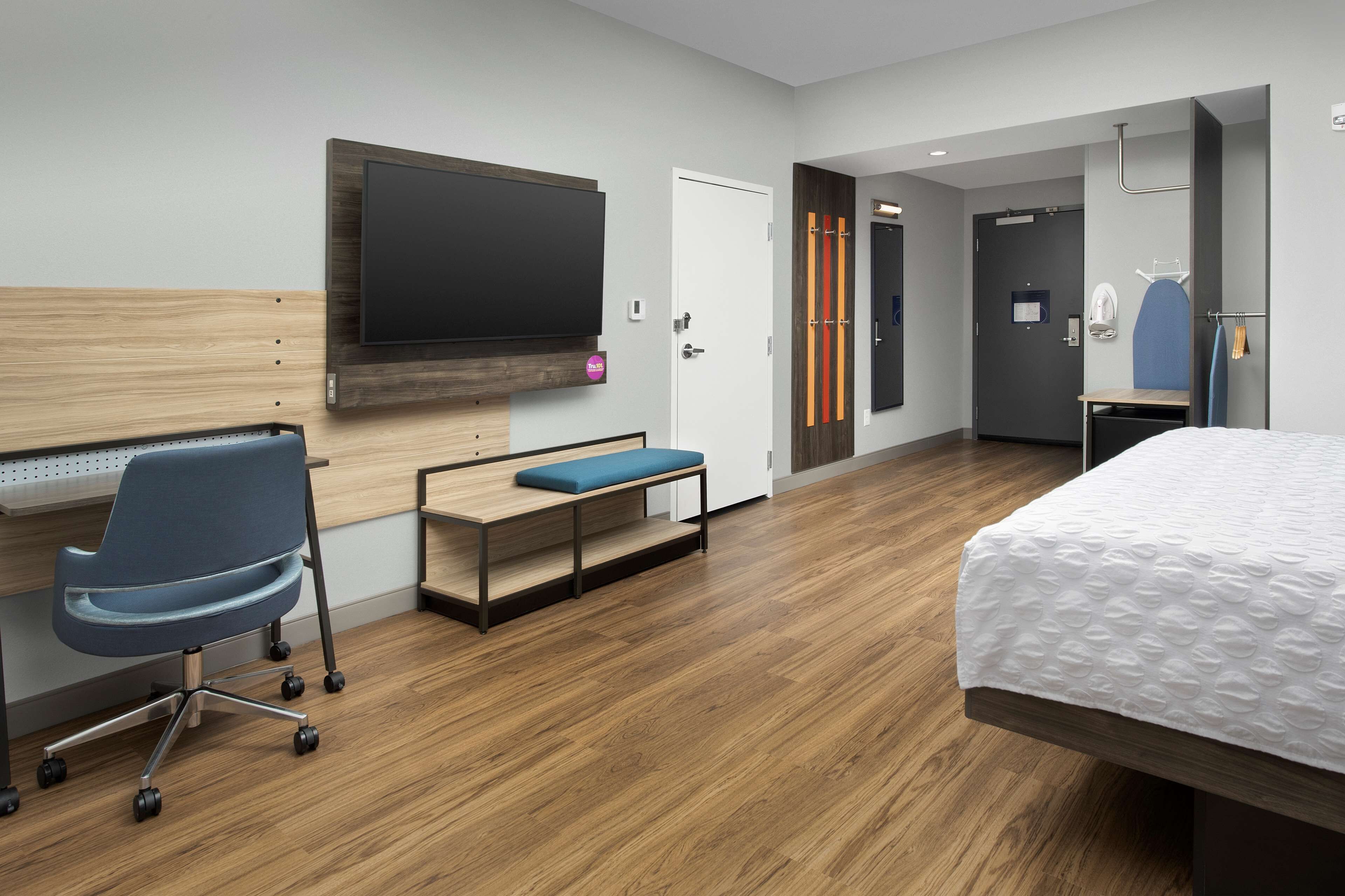 desk, laptop workspace, blackout curtains, iron/ironing board