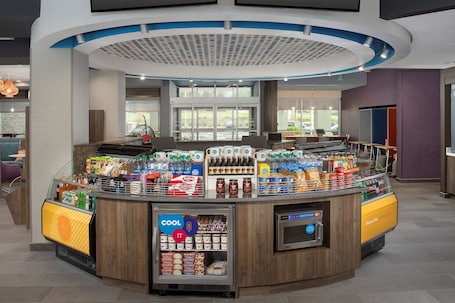 Snack bar. Tru by Hilton Charlotte Airport Lake Pointe