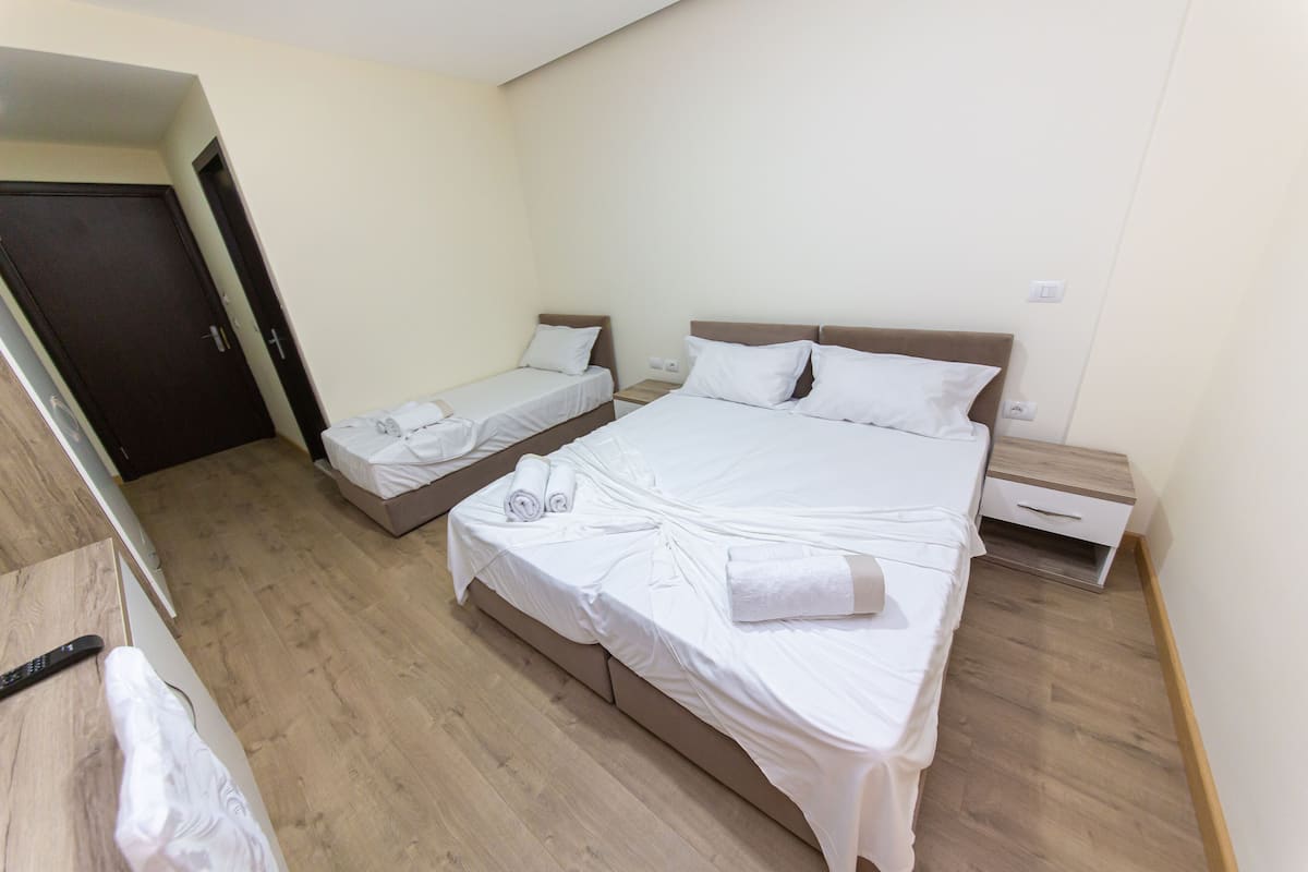 Desk, laptop workspace, free WiFi, bed sheets
