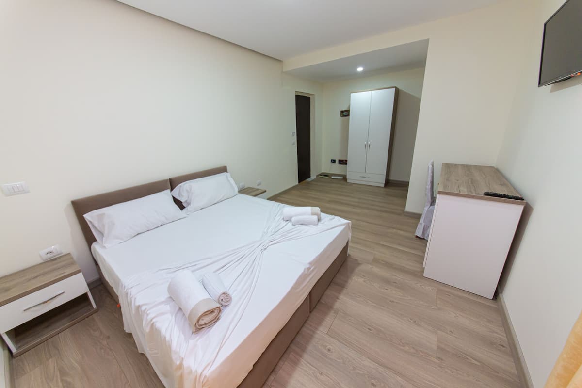 Desk, laptop workspace, free WiFi, bed sheets