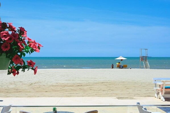 Private beach, sun-loungers, beach umbrellas, beach bar