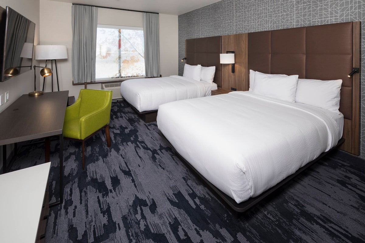 Pillow-top beds, desk, laptop workspace, blackout curtains
