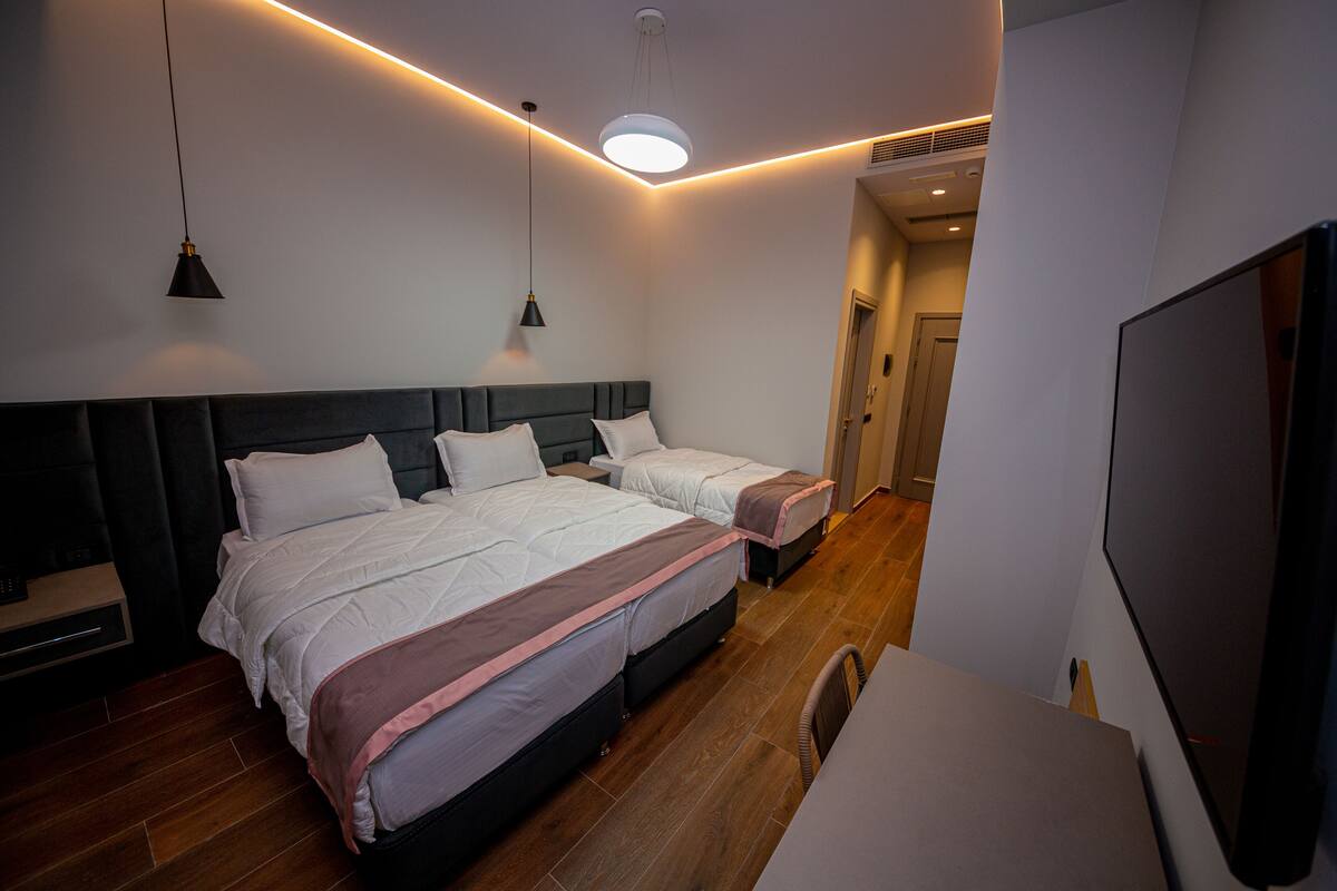 Standard Triple Room, Ground Floor | Minibar, in-room safe, desk, WiFi (free)