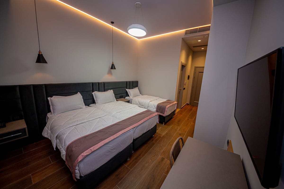 Standard Triple Room, Ground Floor | 1 bedroom, minibar, in-room safe, desk