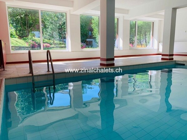 Alberca techada y alberca climatizada