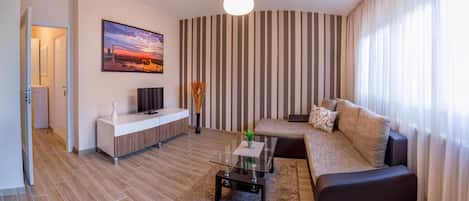 City Apartment, 1 Bedroom, Terrace | Living area | 40-inch LCD TV with cable channels, TV