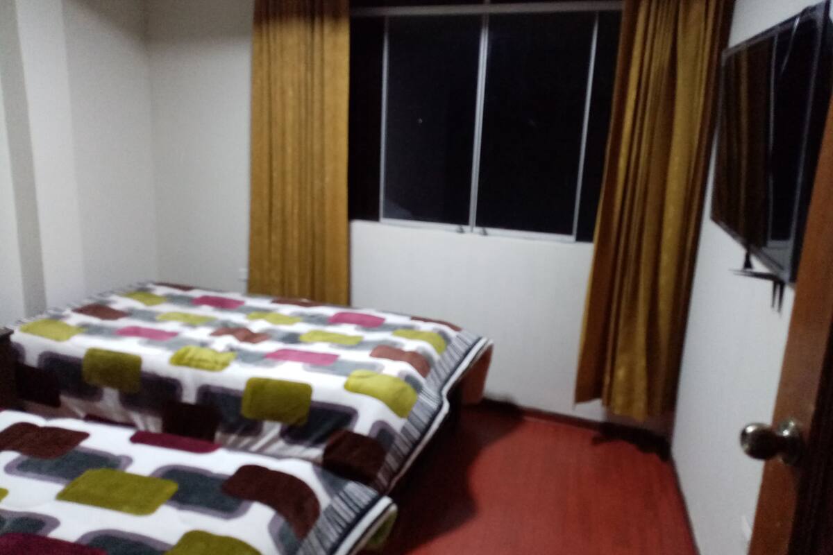 Blackout curtains, iron/ironing board, free WiFi, bed sheets