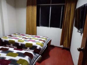 Blackout curtains, iron/ironing board, free WiFi, bed sheets