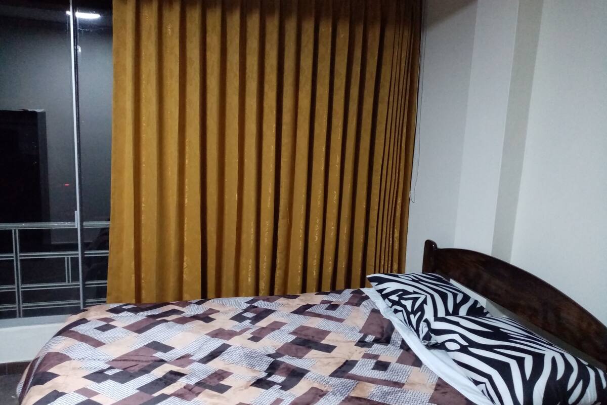 Blackout curtains, iron/ironing board, free WiFi, bed sheets