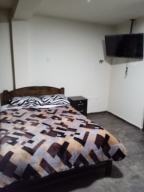 Blackout curtains, iron/ironing board, free WiFi, bed sheets
