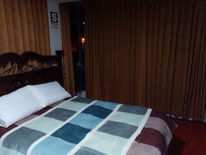 Blackout curtains, iron/ironing board, free WiFi, bed sheets