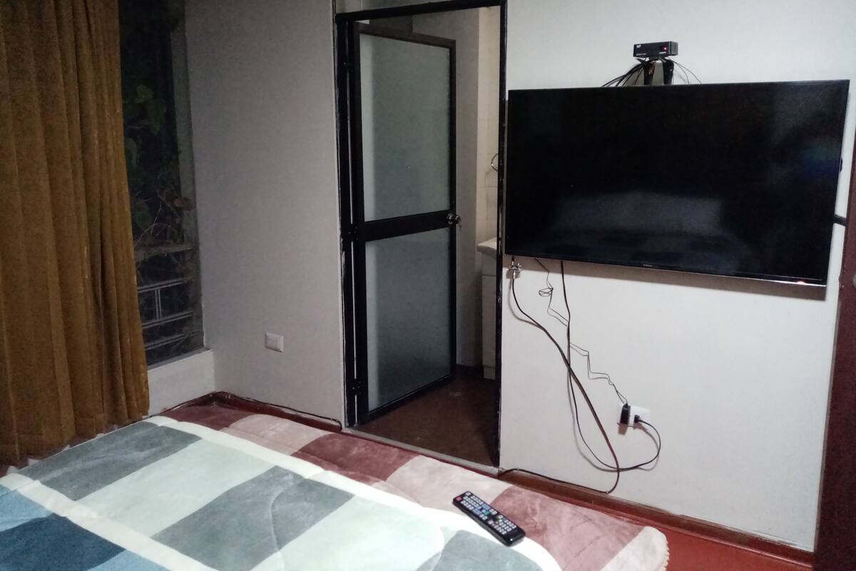 Blackout curtains, iron/ironing board, free WiFi, bed sheets
