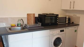 Studio | Private kitchenette | Full-sized fridge, microwave, oven, stovetop