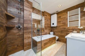 Baignoire, sèche-cheveux, serviettes fournies