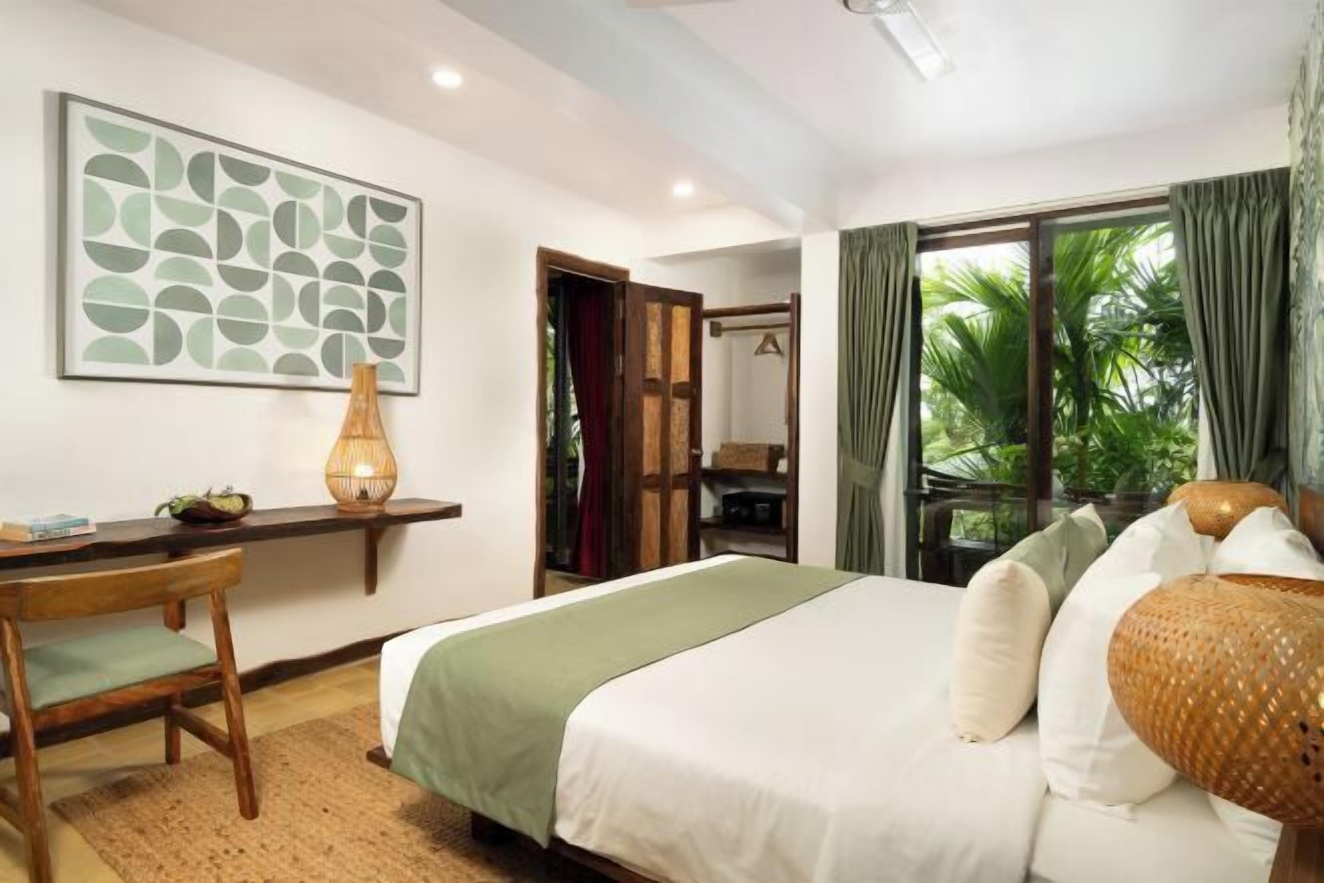 Pillow-top beds, desk, laptop workspace, blackout curtains