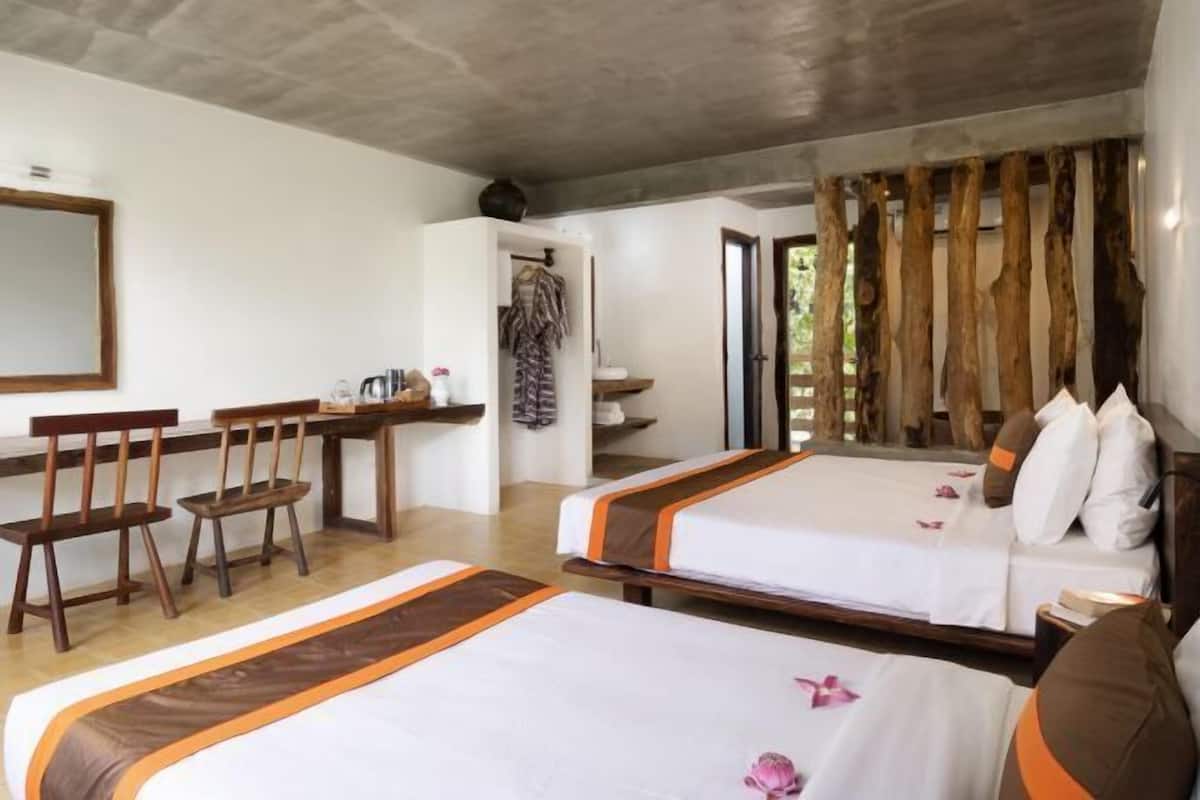 Pillow-top beds, desk, laptop workspace, blackout curtains