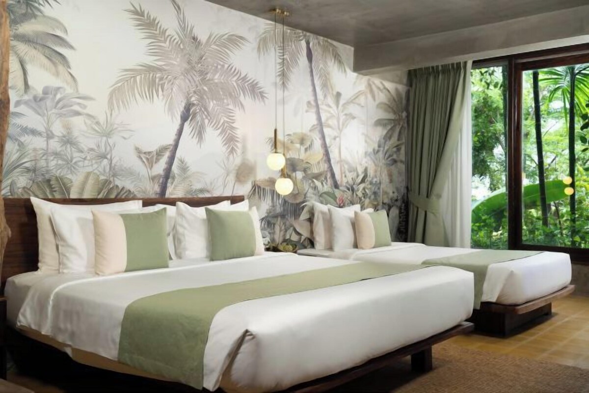 Pillow-top beds, desk, laptop workspace, blackout curtains