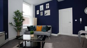 Deluxe Apartment | Ruang tamu | TV skrin rata