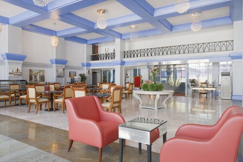 Capital O 44162 Royal Palms Hotel - Rose Collection