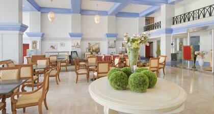 Capital O 44162 Royal Palms Hotel - Rose Collection