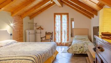 Family Suite, Multiple Beds, Shared Bathroom, Garden View | Desk, blackout drapes, iron/ironing board (on request), cribs (free)