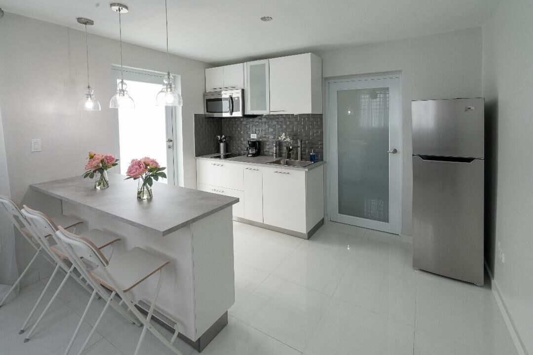 Fridge, microwave, stovetop, coffee/tea maker