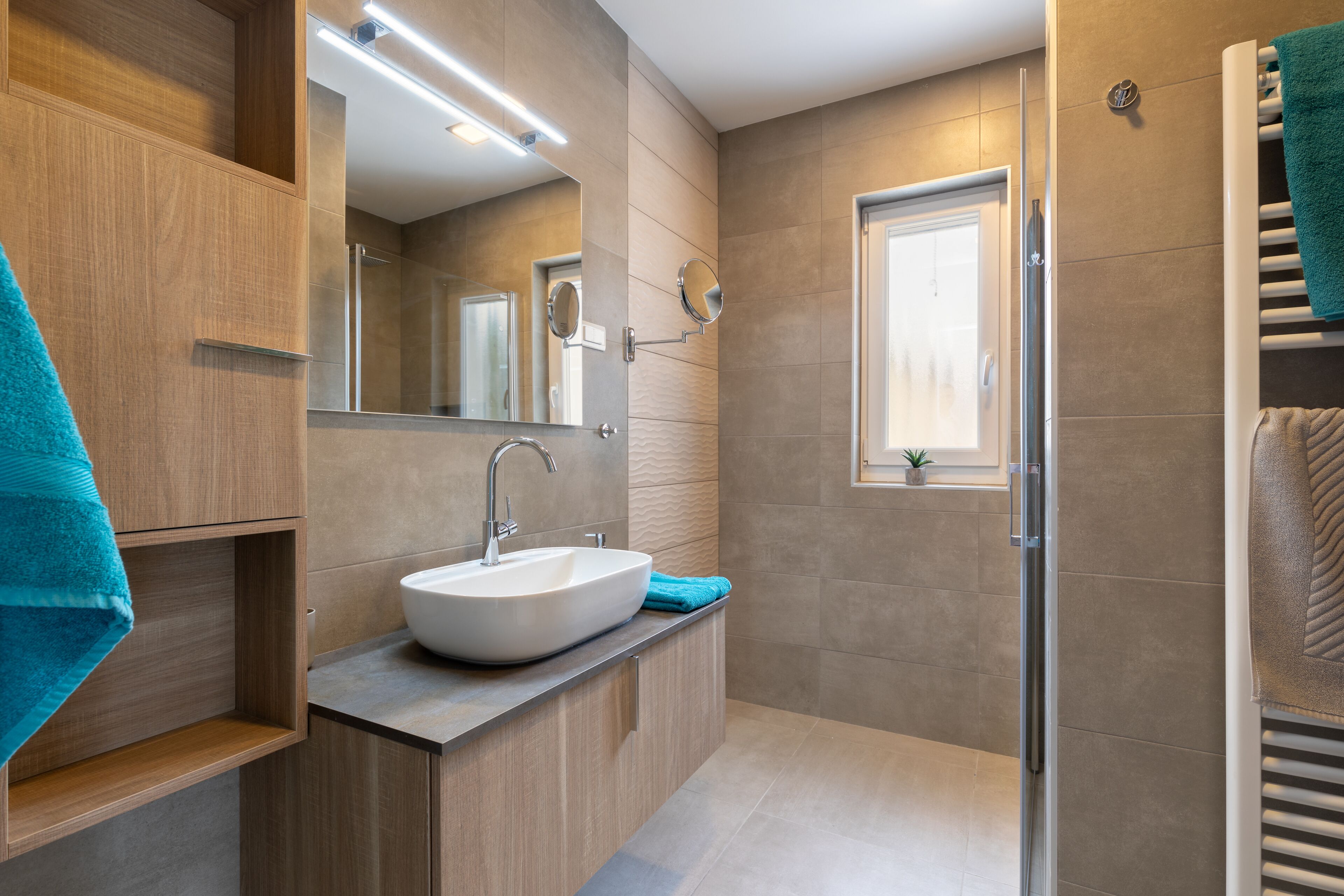 Shower, hair dryer, towels, toilet paper