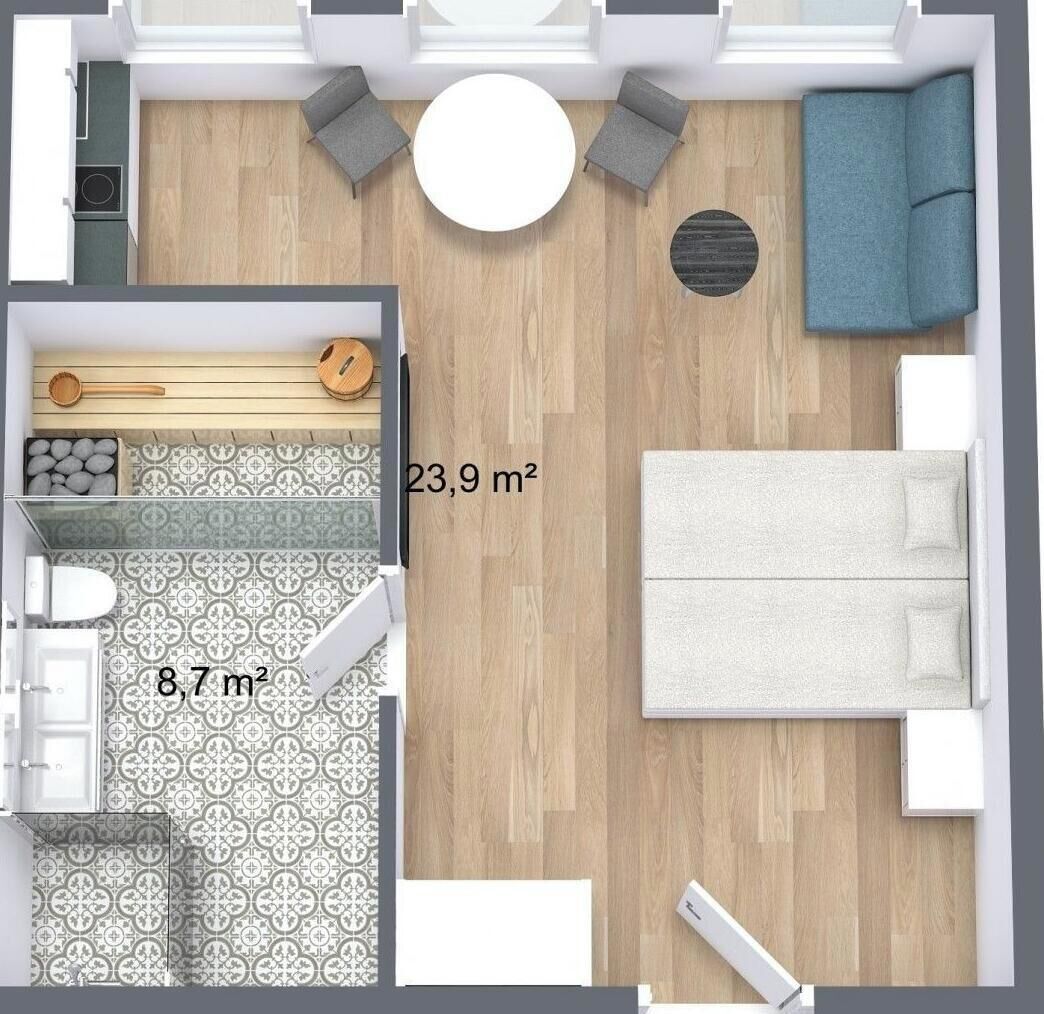A 23.9 m² living area with a sofa, a round table, and a kitchen area measuring 8.7 m².