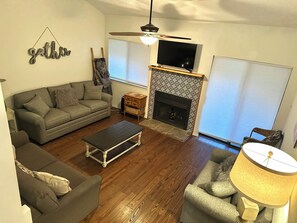 Smart TV, fireplace, DVD player, books