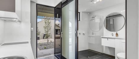 Shower, rainfall showerhead, designer toiletries, hair dryer