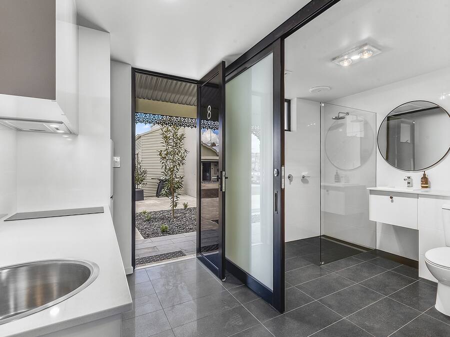 Shower, rainfall showerhead, designer toiletries, hair dryer
