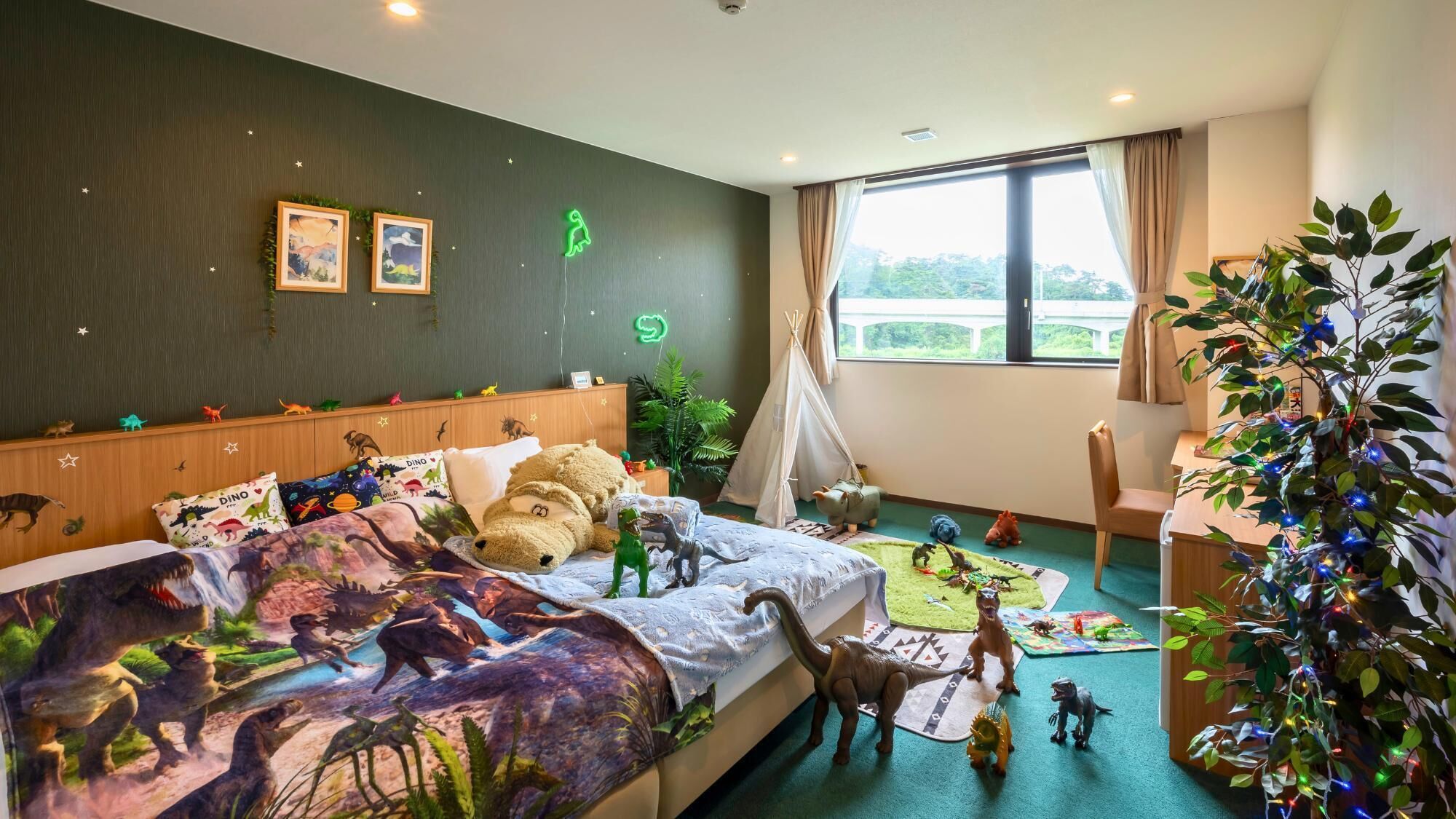 A bedroom with a bed, a window, a chair, and a plant.