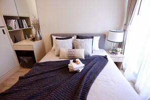 Individually decorated, individually furnished, desk, blackout curtains