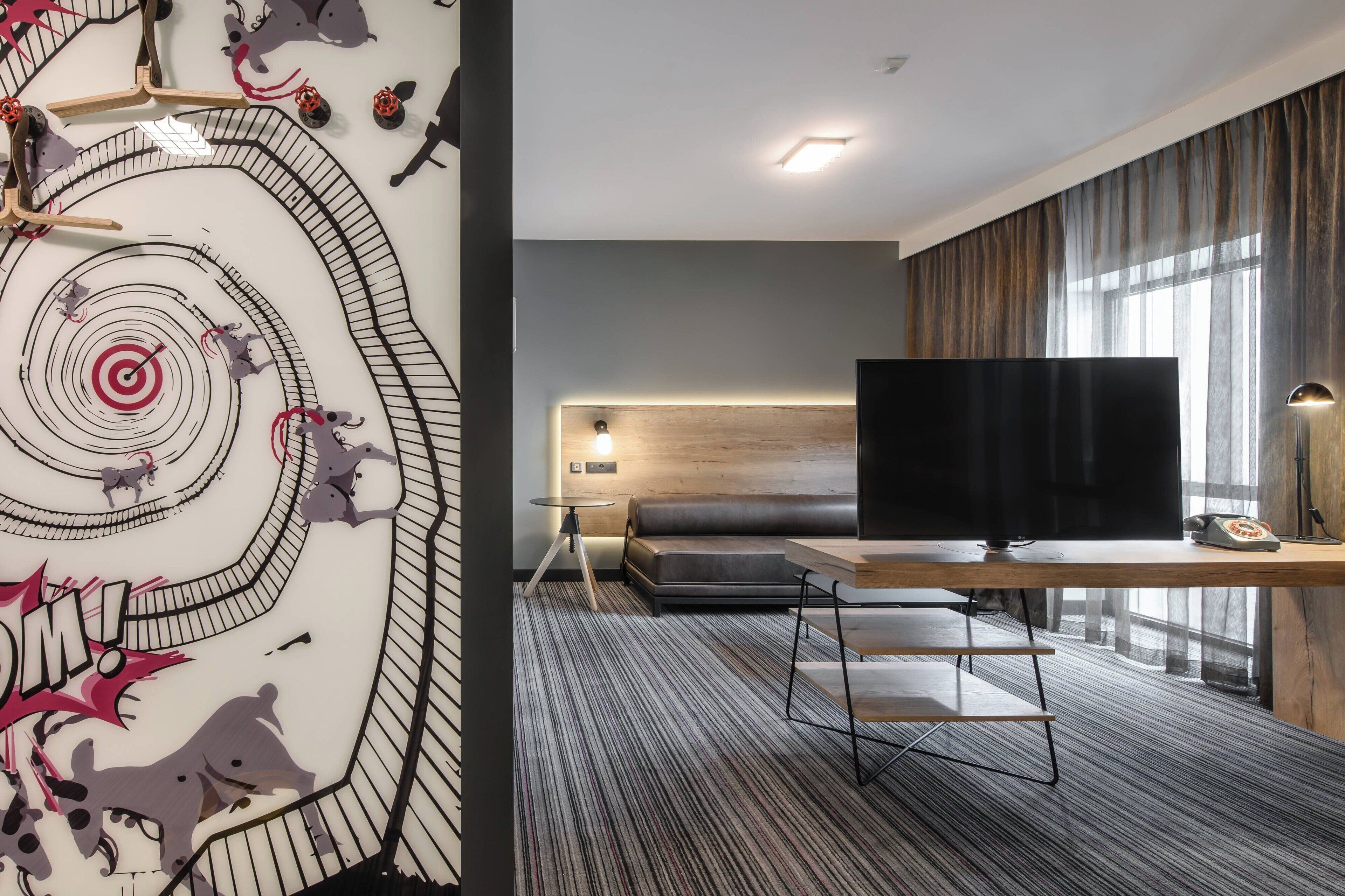 hypo-allergenic bedding, desk, laptop workspace, blackout curtains