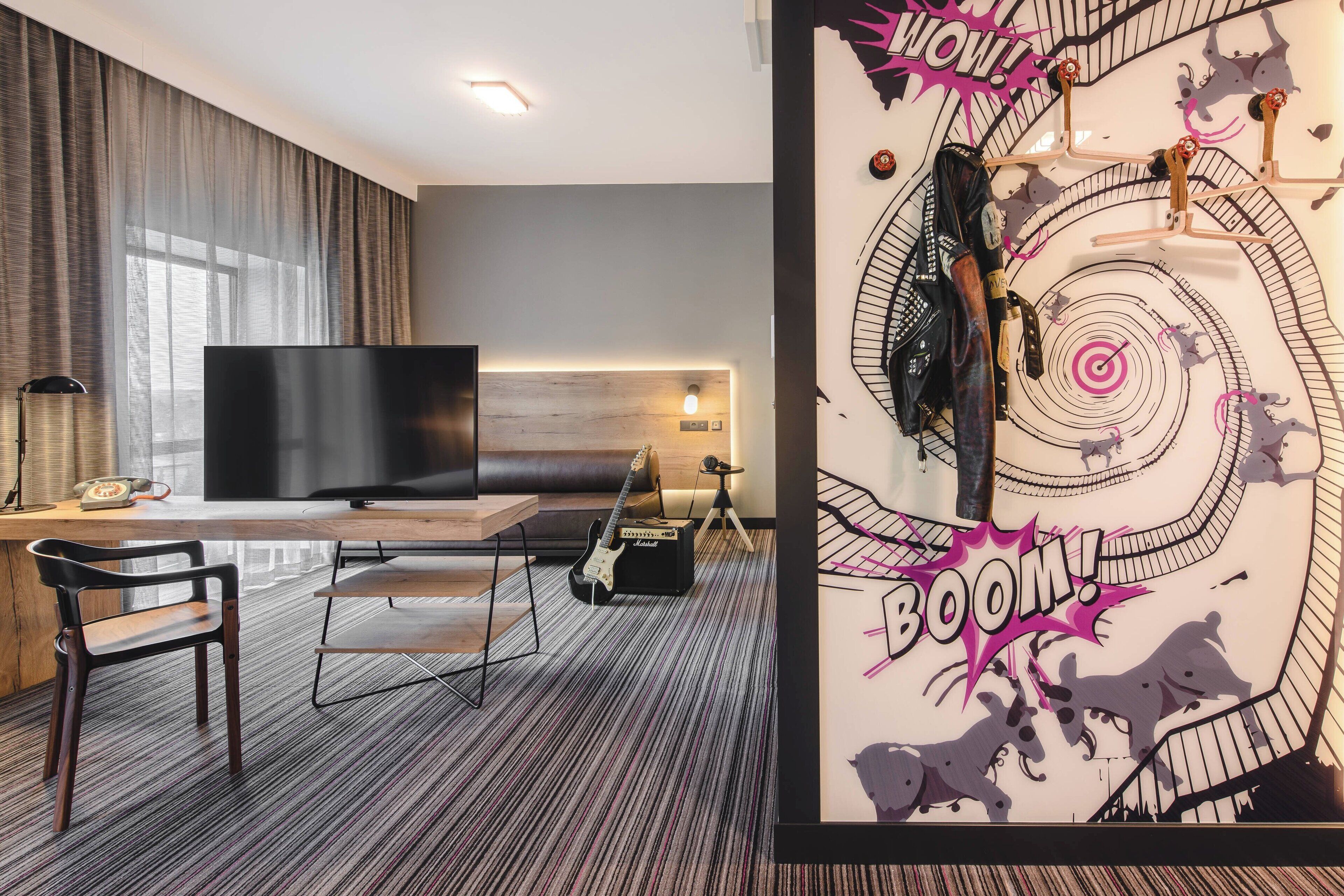 hypo-allergenic bedding, desk, laptop workspace, blackout curtains