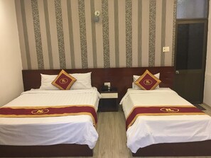 Superior Triple Room | Minibar, blackout curtains, iron/ironing board, free WiFi - New Legend Hotel (Ho Chi Minh City)