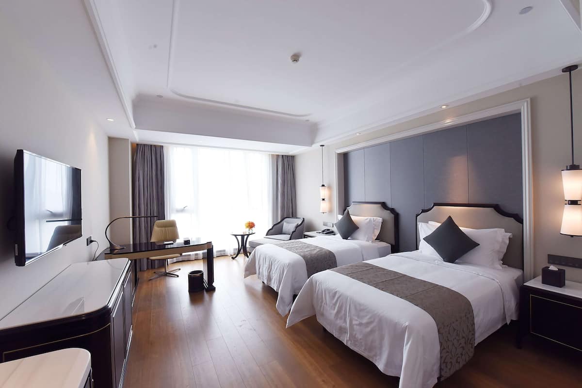 Habitación Deluxe, 2 camas individuales, para no fumadores | Ropa de cama