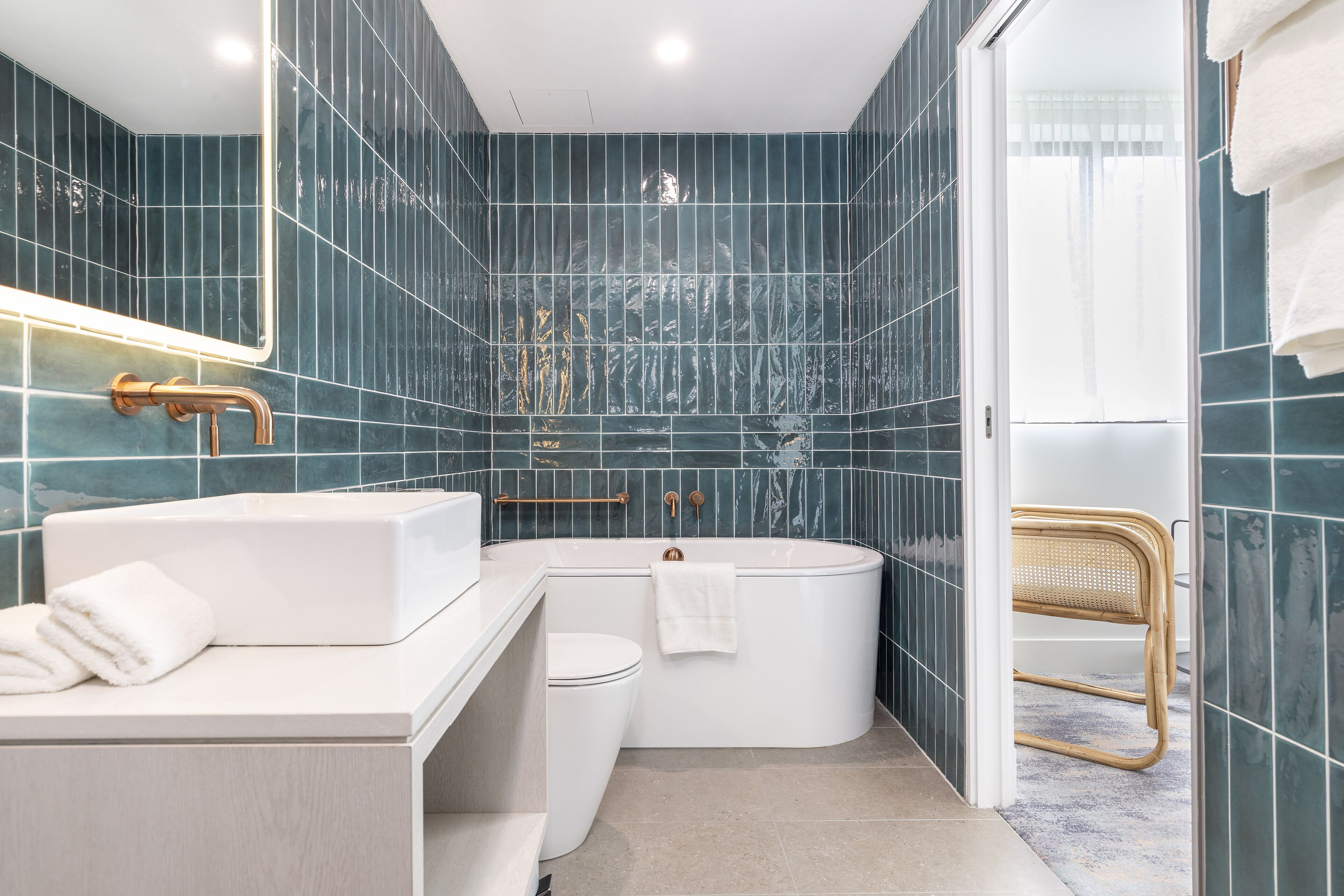 deluxe king with bath | bathroom | shower, free toiletries, hair dryer, towels