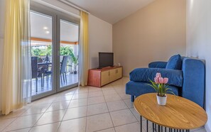 Departamento (A12) | Área de sala de estar | Televisión de pantalla plana 