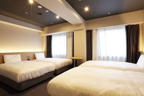 Quartet Room | In-room safe, blackout drapes, free WiFi, bed sheets