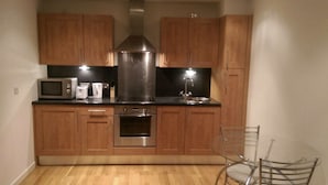 Apartment, 1 Bedroom | Private kitchen | Fridge, microwave, oven, dishwasher - Pulse Apartments (Manchester)