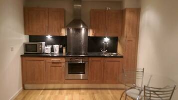 Apartment, 1 Bedroom | Private kitchen | Fridge, microwave, oven, dishwasher