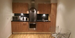 Apartemen, 1 kamar tidur | Dapur pribadi | Lemari es, microwave, oven, dan mesin pencuci piring