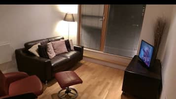 Apartment, 1 Bedroom | Living area | Flat-screen TV