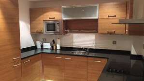 Apartment, 1 Bedroom | Private kitchen | Fridge, microwave, oven, dishwasher - Pulse Apartments (Manchester)