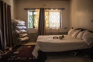 Comfort Bungalow, 2 Bedrooms, Terrace, Garden View | 2 bedrooms, down comforters, iron/ironing board (on request), bed sheets - Reens Group of Homes (Nakuru)